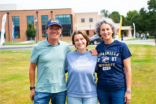 parent posing with daughter