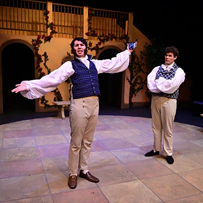 Two actors performing in spring play