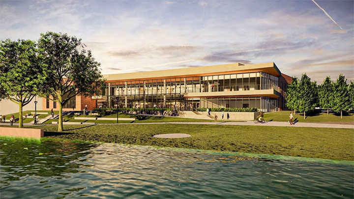 Artist rendition of new Sharnburge Business building with an exterior of brick and glass set on a hill adjacent to Cedar Lake.