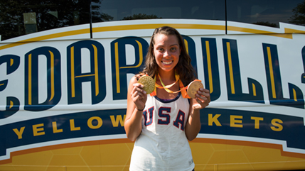 Grace Norman holding medals