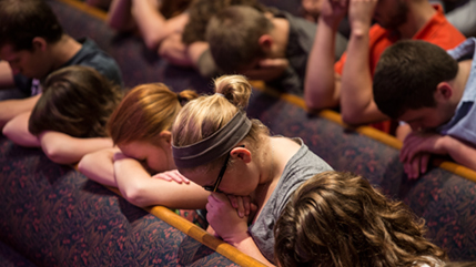 Students praying.