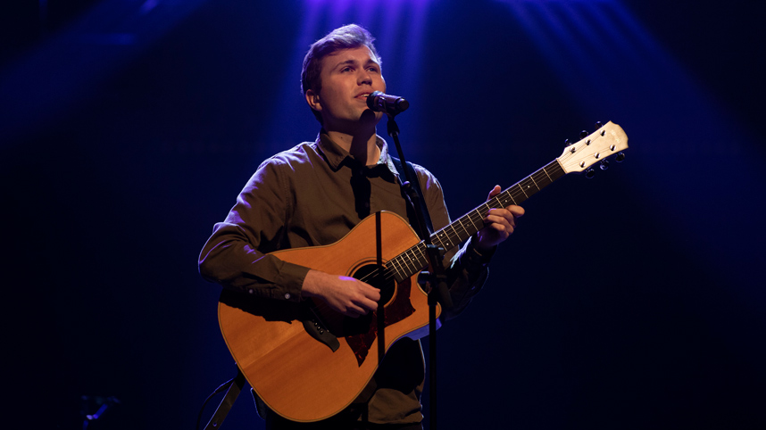 Ben Knudson leads worship during a chapel service in October 2019.
