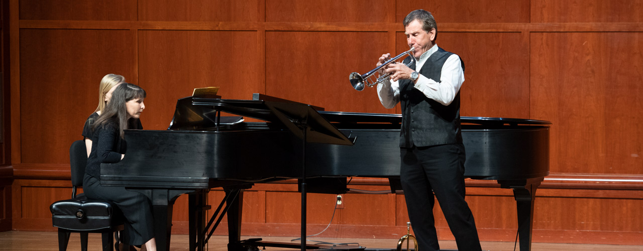 Professor Charlie Pagnard performs during a recital