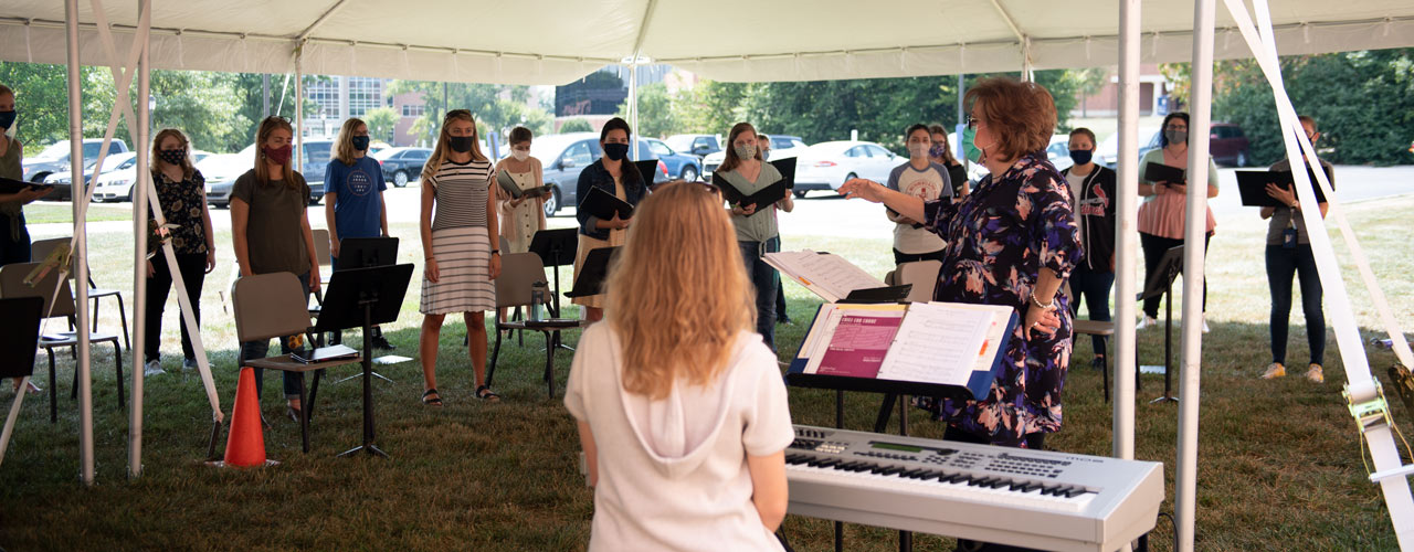 Dr. Beth Porter teaching an "in tents" music class