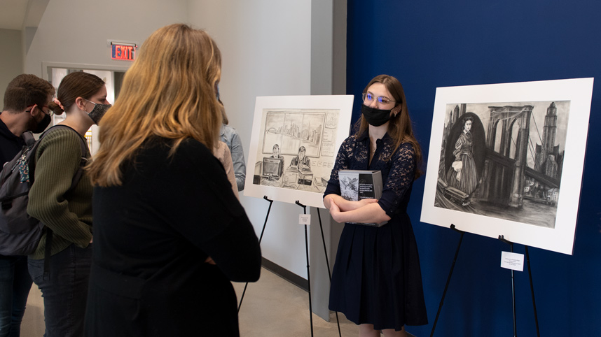 Sierra Harriman talks about her artwork during the unveiling