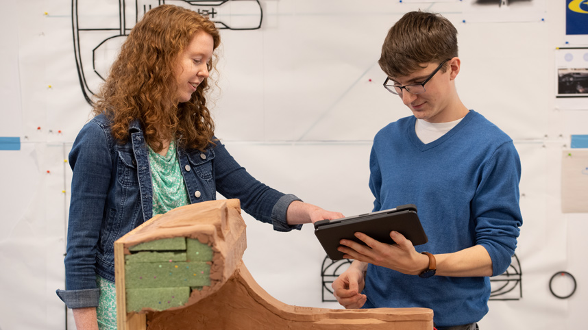 IID students working on foam and clay car model