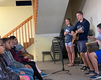 Discipleship Council members lead worship with students at Immanuel Mission