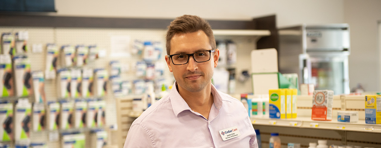 Dr. Justin Coby, director of Cedar Care Village Pharmacy