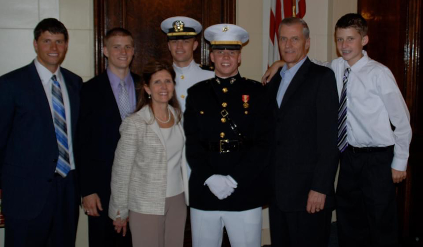 Jeff and Criss Reep with their sons, two of them in uniform, a few years ago
