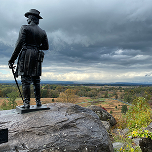 A statue of Union General Gouverneur K. Warren overlooking the battlefield from Little Round Top in Gettysburg, Pennsylvania