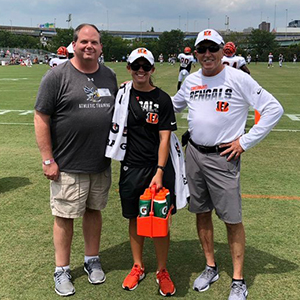 athletic training program director Mike Weller on left, with Bengals athletic trainer Kelsey Howell center, and Bengals head athletic trainer Paul Sparling right