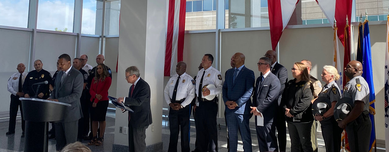 Dr. Patrick Oliver speaking at the Governor's press conference June 23, 2021 announcing the College to Police Pathway Program