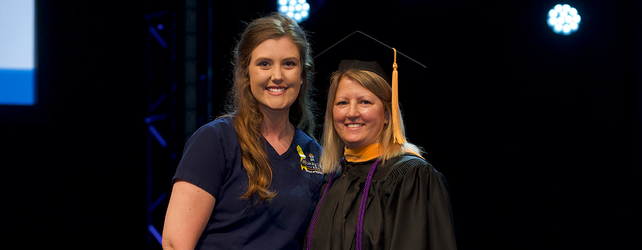 Suzanne Lefever, assistant dean of the Cedarville University School of Nursing and director of the school’s undergraduate program, at the 2021 pinning ceremony with 2021 Bachelor of Science in Nursing graduate Addalyn Love.