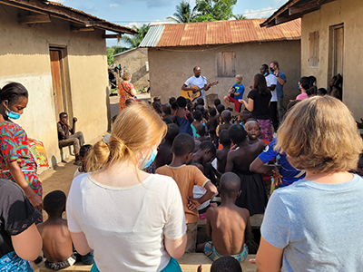 Students and faculty from the Cedarville University School of Nursing participate in a local children’s ministry during a mission trip to Togo last summer.