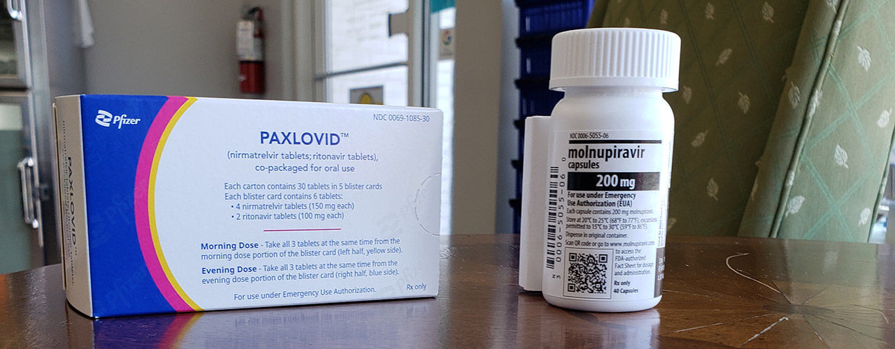 Paxlovid (left) and Lagevrio (right), two COVID-19 antivirals that are now available at Cedar Care Village Pharmacy.