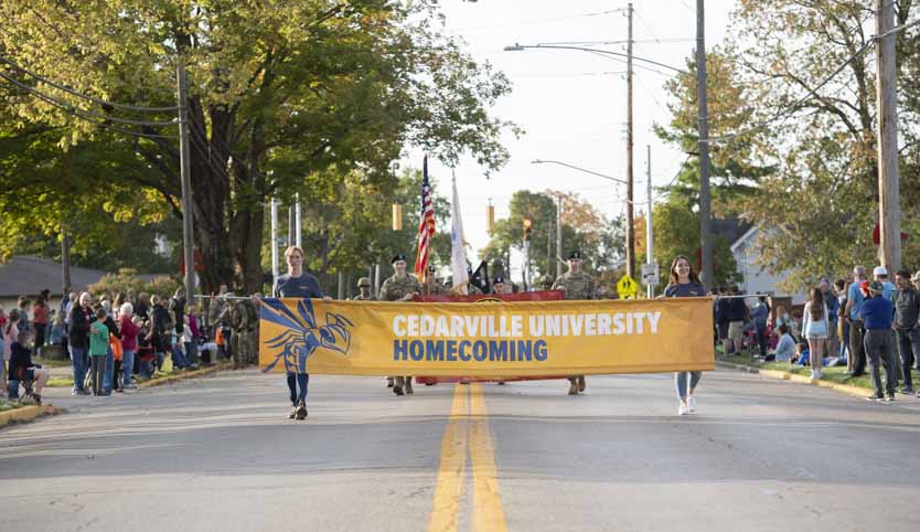Students walking in the annual homecoming parade