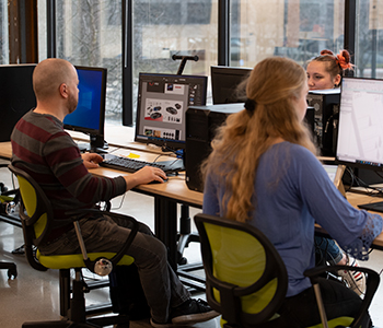 Industrial and Innovative Design students working on computers at the International Center for Creativity