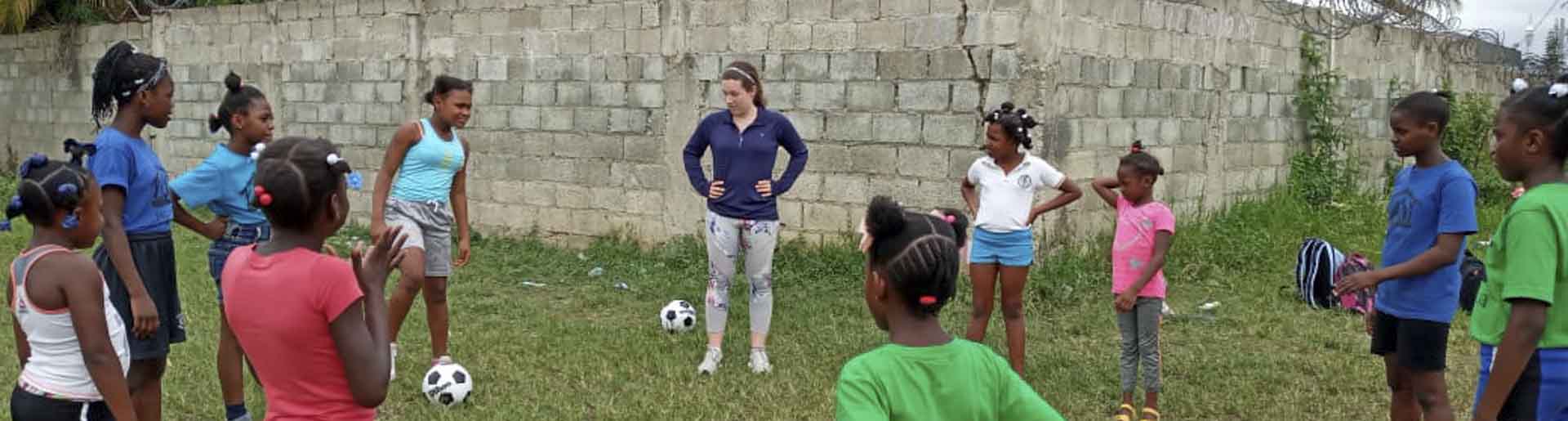 Katie Baird pictured at a soccer practice with girls from the two local schools Lafwa ran