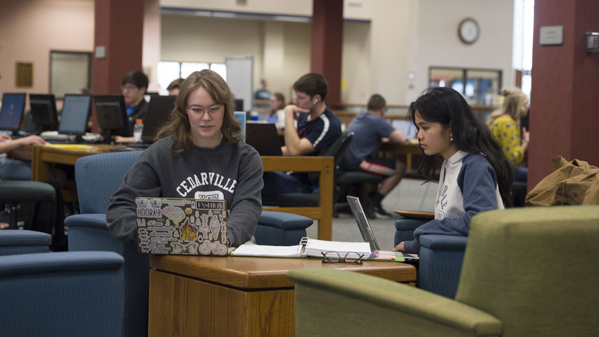 Two female students studying in Cedarville University’s Centennial Library.