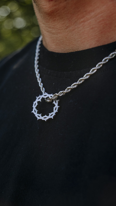 A Crowned Chain with the crown of thorns charm.