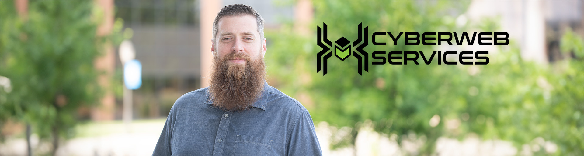 Adam Dyer and the CyberWeb Services logo.