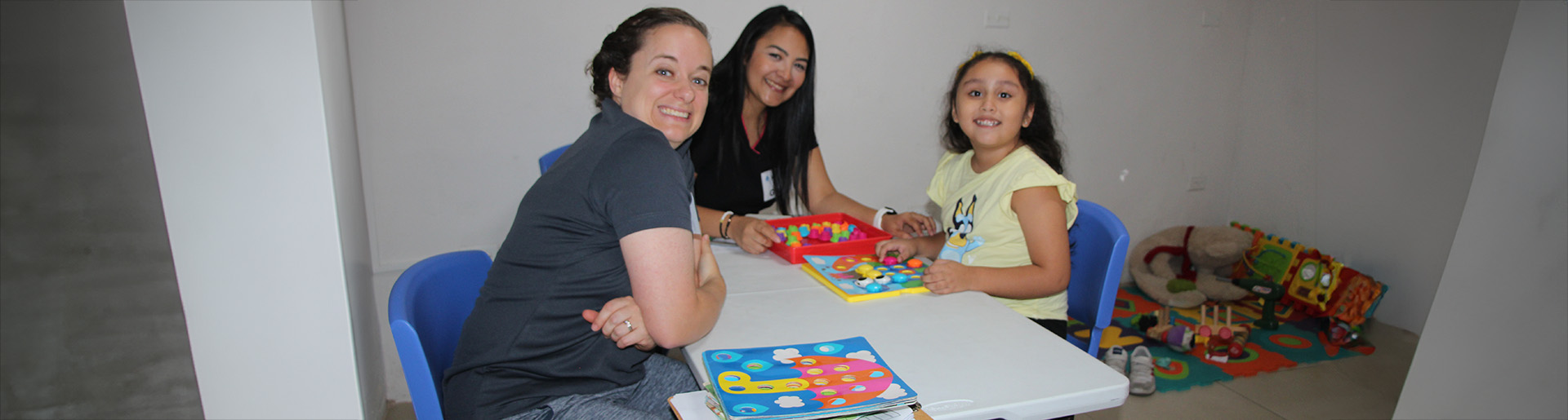 Dr. Megan Brown assists with autism screening.
