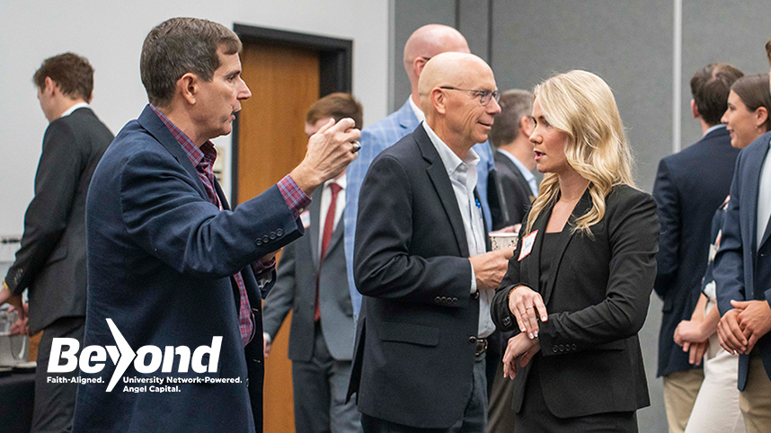 Dr. Haymond interacts with students and guests at a Beyond Angels event.