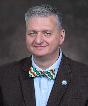 Dr. Mark Caleb Smith