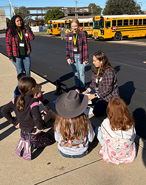 Student teachers use western theme to teach elementary students geography.