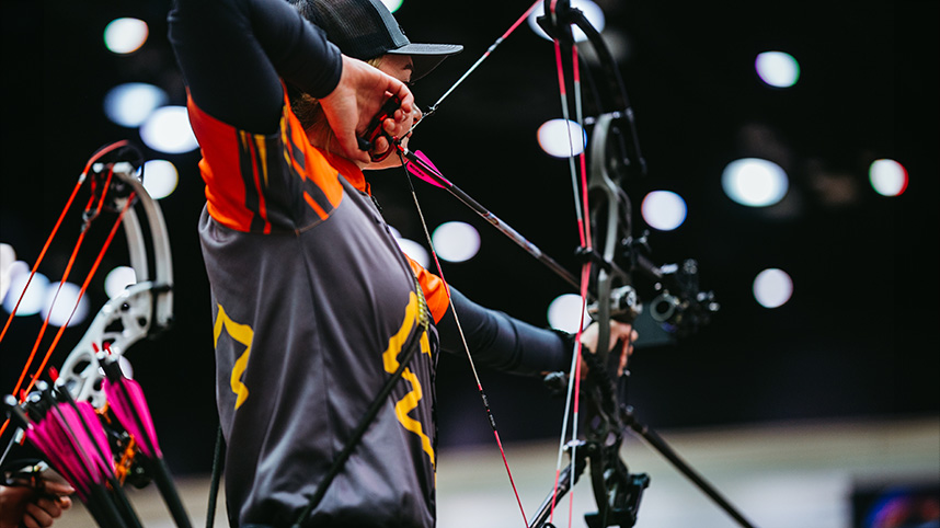 Gracen Fletcher competing in archery competition.