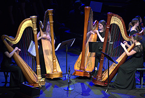 Cedarville students playing harps.