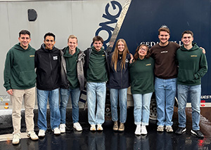 Heartsong team beside music trailor.