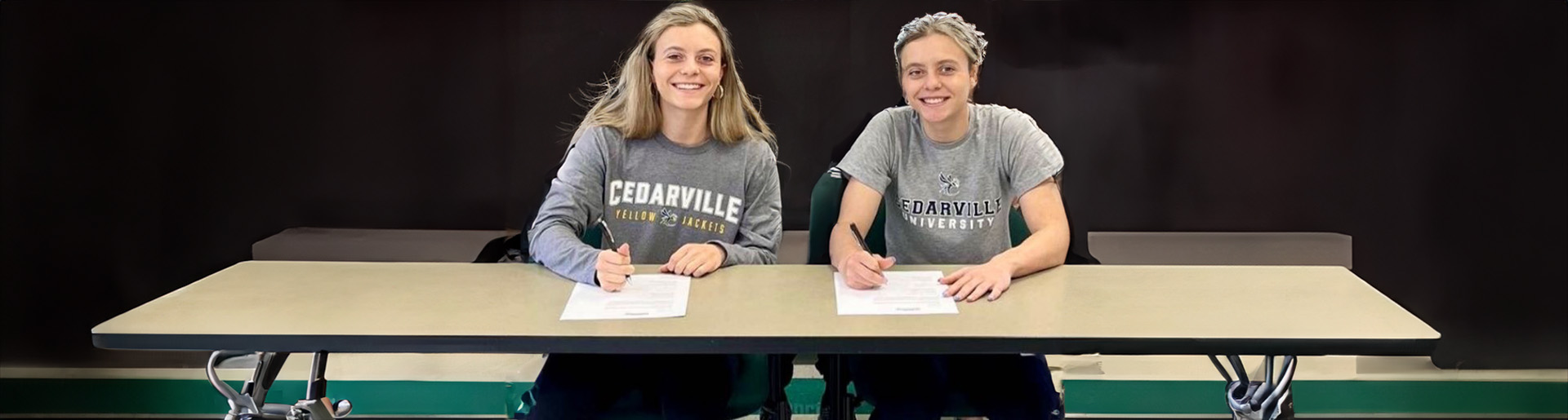 Julie and Ari Thompkins sign to run at Cedarville University.