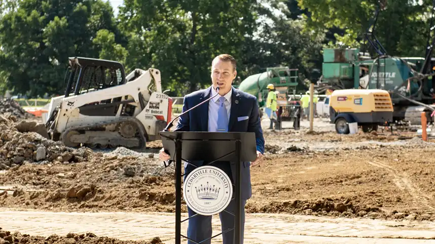 Dr. Thomas White speaking at Bolthouse Academic Center construction site.