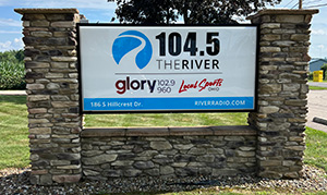 Sigh outside The River Radio headquarters.