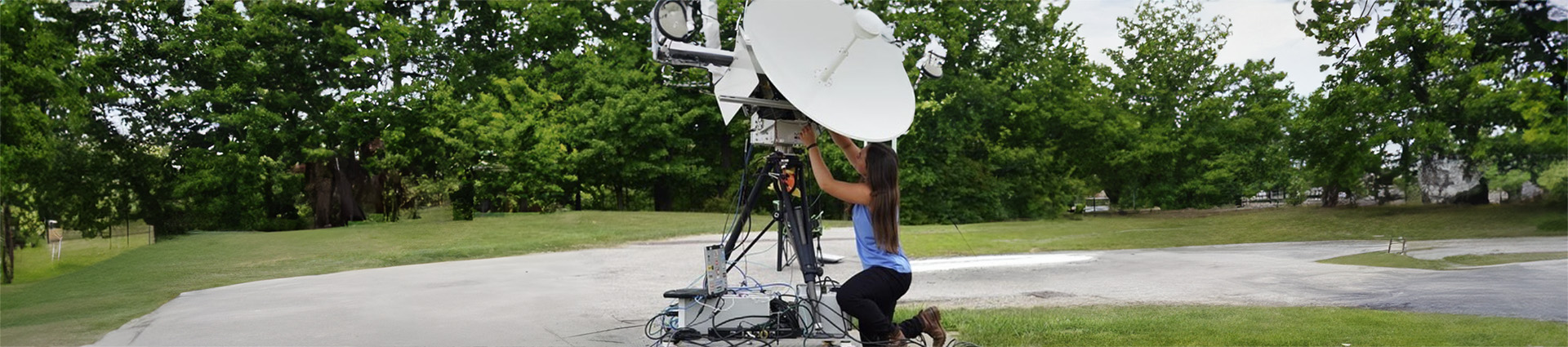 Lauryn Leslie working on equipment for NASA.
