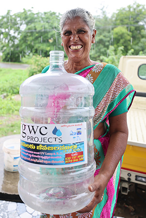 Srinama smiles because she has access to clean water in Nandigama, India.
