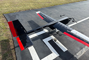 AERO team plane sits on the tarmac.