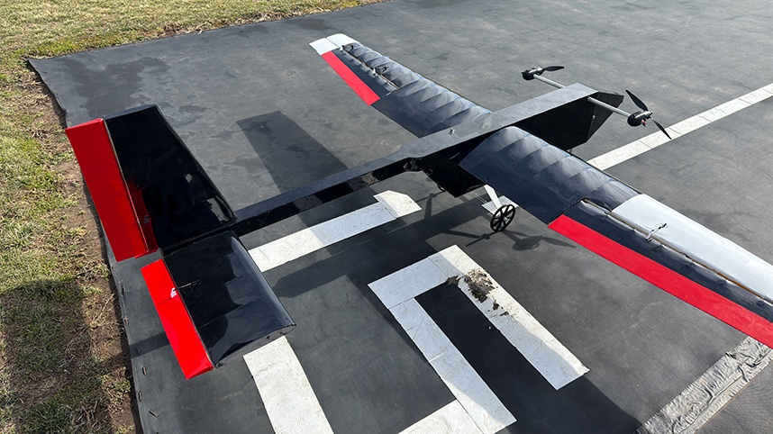 AERO team plane sits on the tarmac.