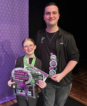 Brandon Stover with one of his dance students.