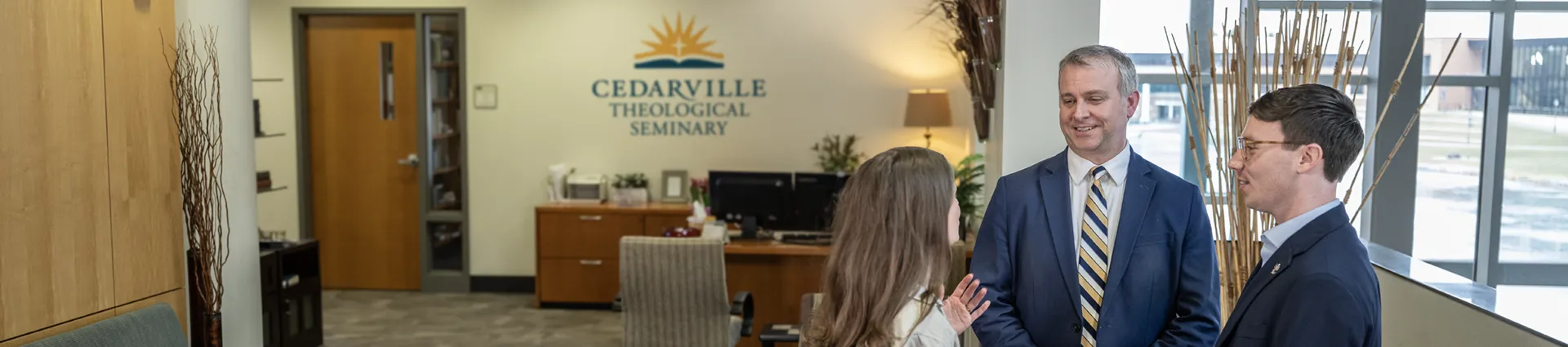 Dr. Billy Marsh talks with students.