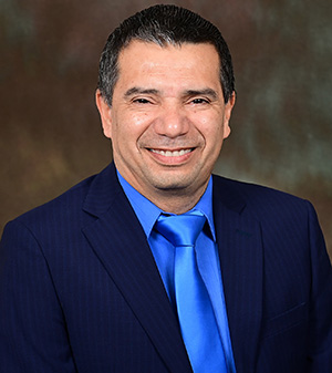 Dr. Carlos Elias.