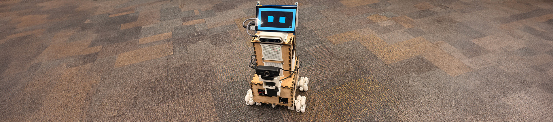 CEDAR is a small robot built by Cedarville University studnets to give tours of the engineering and science building.