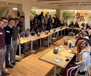 Cedarville students share a meal with other young entrepreneurs in Chile.