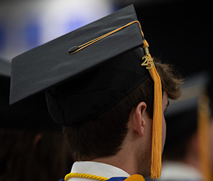 A Cedarville student wearing a graduation cap.