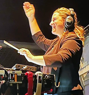 Dani Lee Hutch conducting.