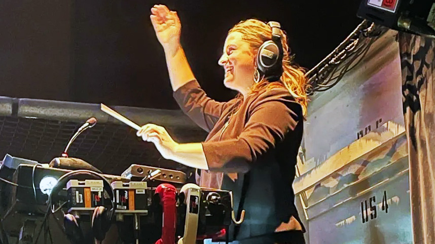 Dani Lee Hutch conducting.