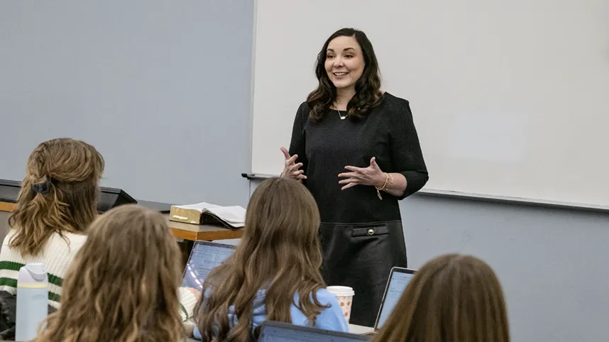 Female professor instructs women for service in the church.