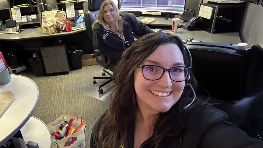 Summer Grey and her friend Ashley in the dispatch office.