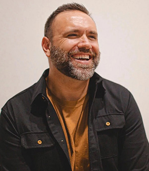 Drew Hensley laughing.